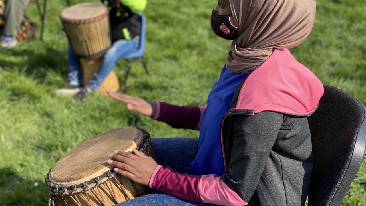 African drumming workshop in Canal Park, Butetown