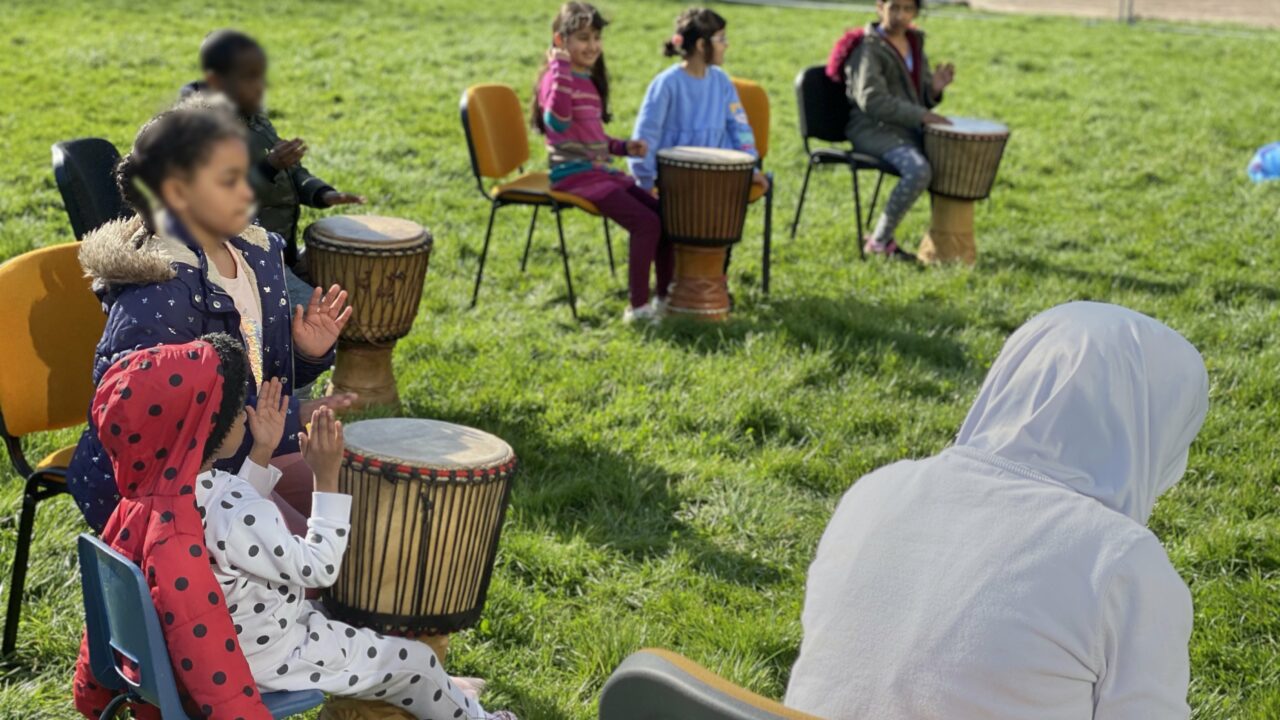 African drumming workshop in Canal Park, Butetown