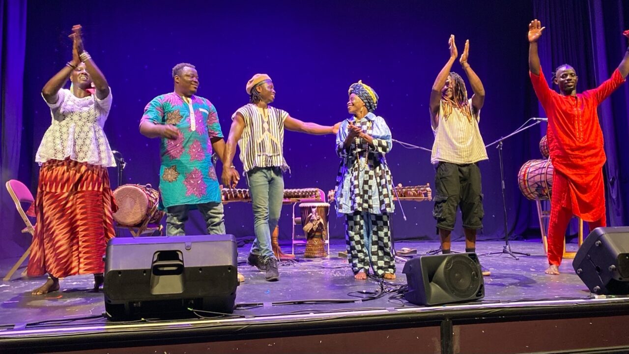 Fatoumata Kouyate Djeliguinet on stage with N'famady Kouyate and guests at The Welfare Ystradgynlais