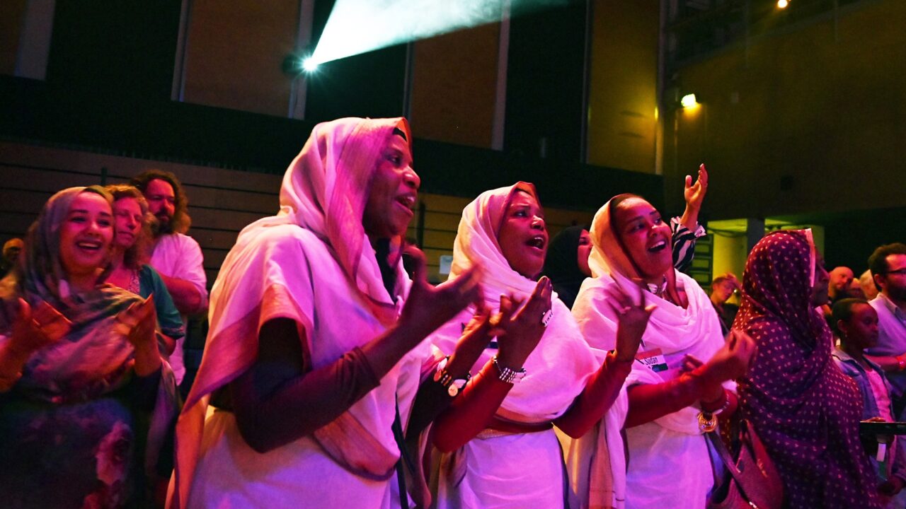 Audienec at Rasha performance - a group of local Sudanese women