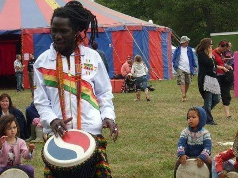 Emmanuel Okuni Annang with djembe